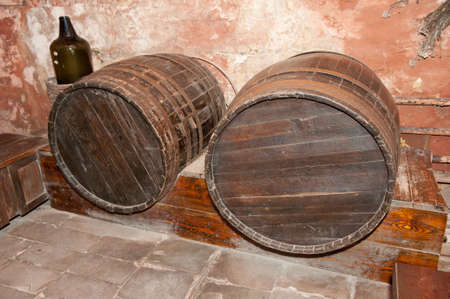 Cellar with casks. An old basement with wine casks