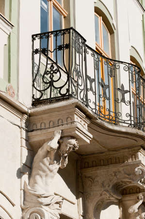 Facade of a building with a balcony. The building is constructed 1850-1890の写真素材