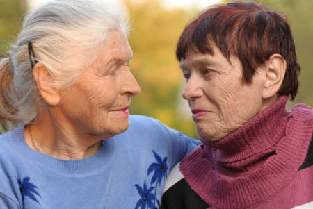 Two sisters of old age. A photo on outdoorsの写真素材