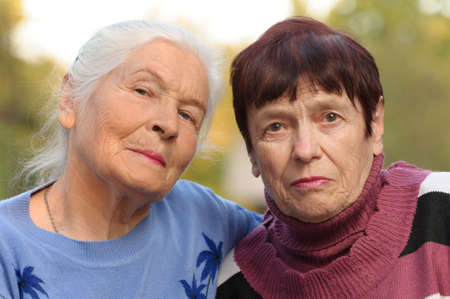 Two sisters of old age. A photo on outdoorsの写真素材