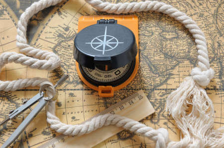Travel object. Old map, a rope, a compassの写真素材