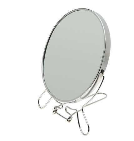 Mirror. The mirror in an iron frame is isolated on a white backgroundの写真素材