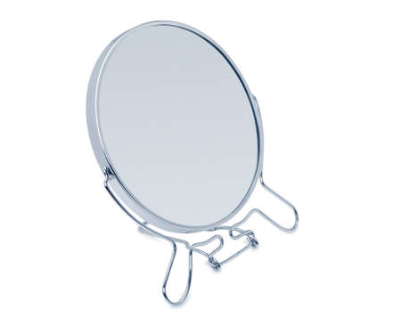 Mirror with shadow. The mirror in an iron frame is isolated on a white backgroundの写真素材
