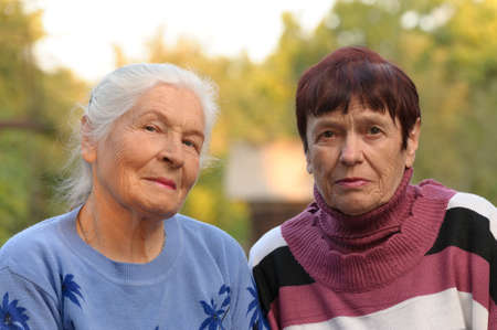 Two sisters of old age. A photo on outdoorsの写真素材