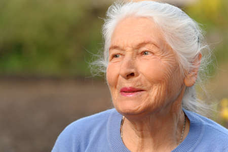 Portrait of the elderly woman. A photo on outdoorsの写真素材