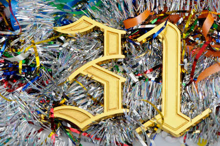 Gold figures 31. Figures lie on a celebratory tinsel.Concept eve of New Yearの写真素材