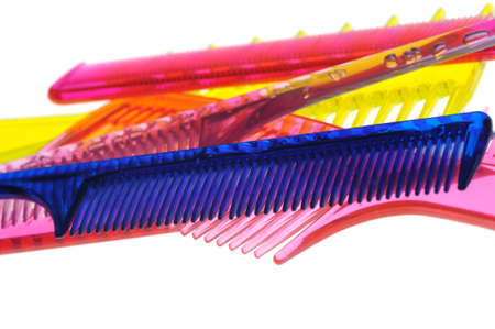 Set multi-coloured transparent combs. It is photographed on a gleam. It is isolated on a white backgroundの写真素材
