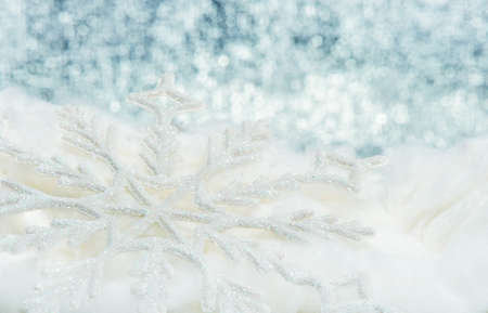 Snowflake big close up. Bokeh a background. Toning is blueの写真素材