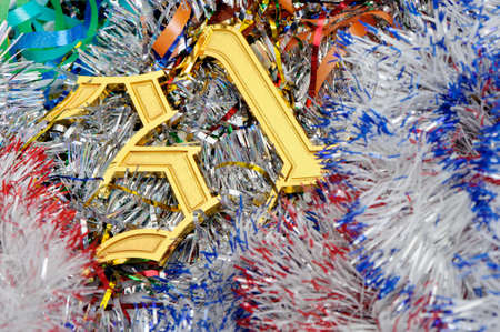 Gold figures 31. Figures lie on a celebratory tinsel.Concept eve of New Yearの写真素材