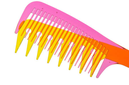 Set multi-coloured transparent combs. It is photographed on a gleam. It is isolated on a white backgroundの写真素材