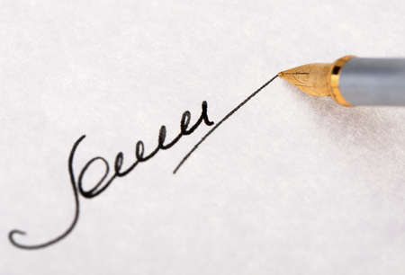 The signature close up and fountain pen. Selective focusの写真素材