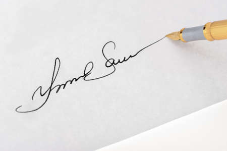 The signature close up and fountain pen. Selective focusの写真素材
