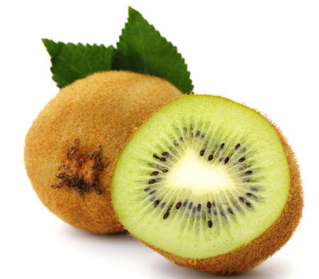 Section kiwi fruit. A detailed photo close up of exotic fruit on a white backgroundの写真素材