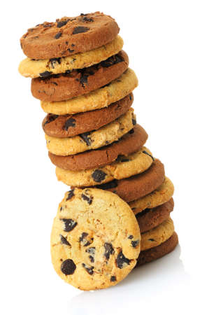 A stack of chocolate chip cookies. Isolated on a white background.の写真素材