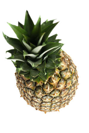 Pineapple. A photo with top. It is isolated on a white backgroundの写真素材