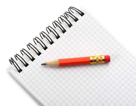 Notebook and pencil. Photo closeup. Isolated on whiteの写真素材