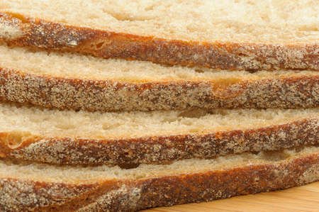 The cut bread on a chopping board. Photo closeupの写真素材