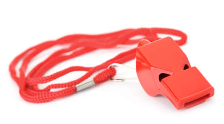 Sports whistle with a lace. It is isolated on a white backgroundの写真素材