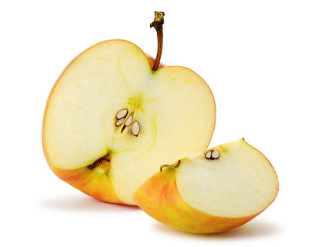 The cut apple. A detailed photo of fruit on a white backgroundの写真素材