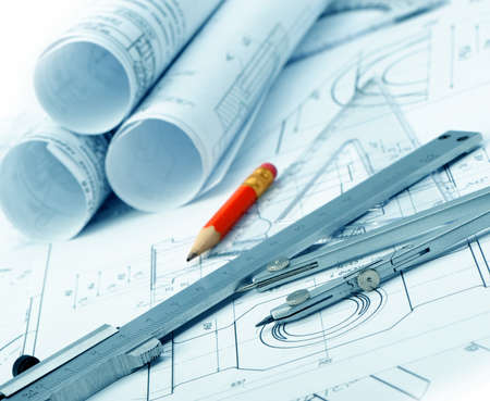The plan industrial details, a protractor, caliper, divider and a red pencil. A photo closeup. Blue toningのeditorial素材