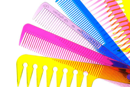 Set multi-coloured transparent combs. It is photographed on a gleam. It is isolated on a white backgroundの写真素材