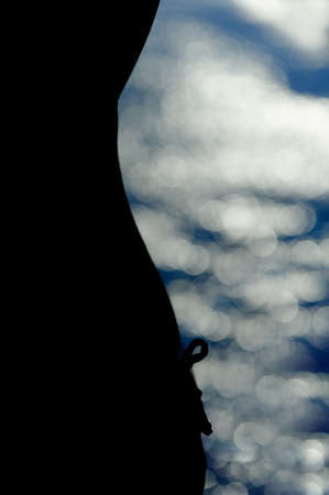 Silhouette of the woman and blur a backgroundの写真素材