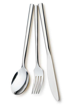 Spoon, fork and a knife. It is isolated on a white backgroundの写真素材