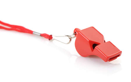 Sports whistle with a lace. It is isolated on a white backgroundの写真素材