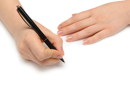 Hand with pen. Over grey empty a paper. Imitation to writeの写真素材