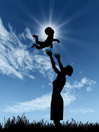 Silhouette of the woman and the baby. The woman throws up the child upwardsの写真素材