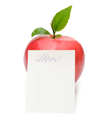 Red apple with a green leaf and memo Menu. Isolated on white backgroundの写真素材