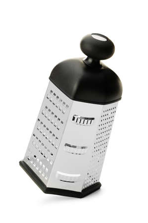 Iron grater, a device which grates food . Isolated on white backgroundの写真素材