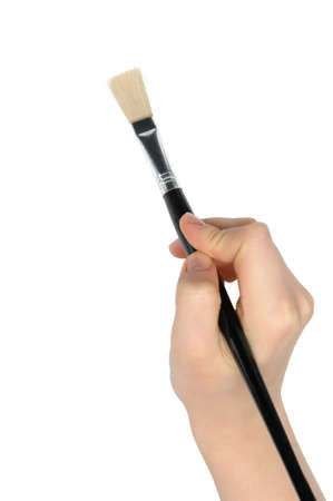 Hand with a brush. It is isolated on a white background. Drawing imitationの写真素材
