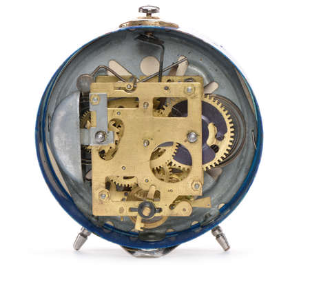 Rear side of the old alarm clock. Isolated on white backgroundの写真素材