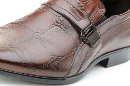 Man's shoes. A red skin. A photo closeup.の写真素材