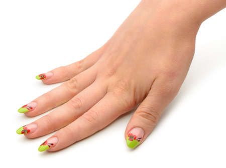 Female hand with manicure closeup. Isolated on white.Drawing red poppy flowers.の写真素材