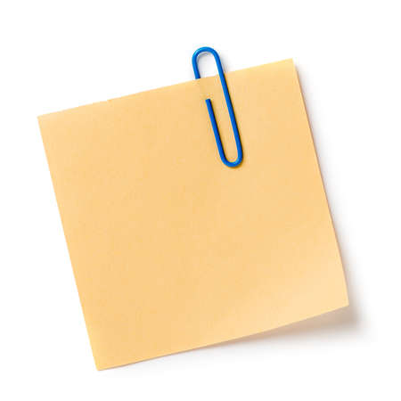 Note with a paper clip. Isolated on a white background with a shadowの写真素材