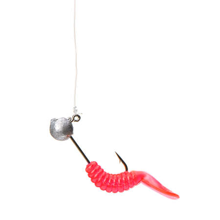 Fly fishing lure isolated on a white backgroundの写真素材