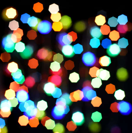 Defocused color background. Blurring the image colourful festive lightsの写真素材