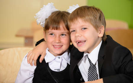 Happy schoolchild. Sitting at a Deskの写真素材