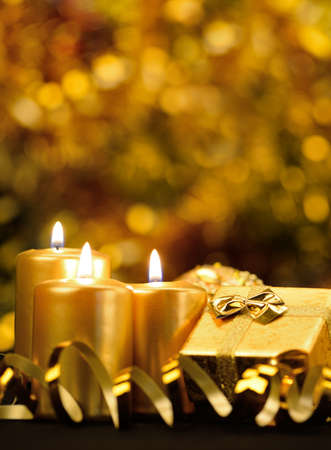 Christmas objects of decoration. Candles, ribbons, giftsの写真素材
