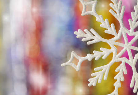Big snowflake. Very blurred backgroundの写真素材