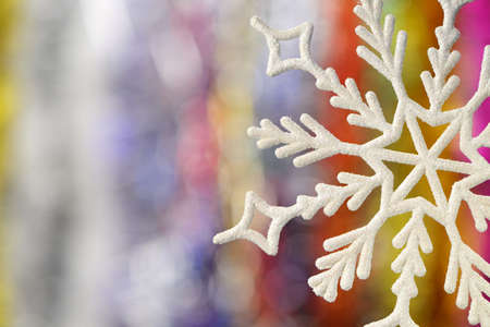 Big snowflake. Very blurred backgroundの写真素材