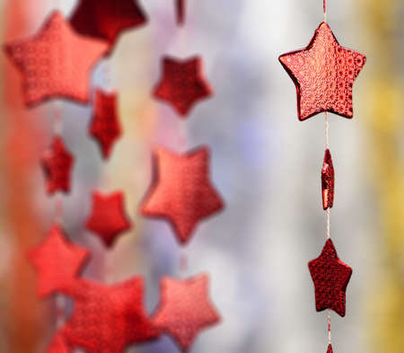Garland of stars. Very blurred backgroundの写真素材