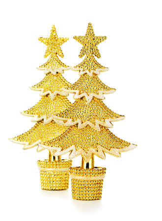 gold decorated Christmas trees. Isolated on white backgroundの写真素材