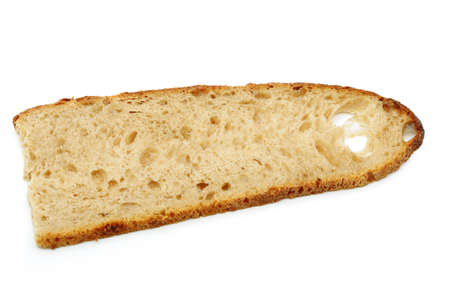 The cut bread. It is isolated on a white background