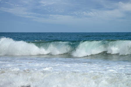 The larger waves. The coast of the Indian ocean. Sri Lankaの写真素材
