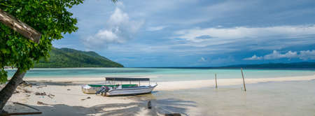 Fisherman Boat on Kri Island, Raja Ampat, Indonesia, West Papua. Bannerの写真素材