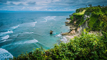 Rock on Impossible Beach in Evening Light, luxus cottage on the hill, Bali Indonesiaの写真素材