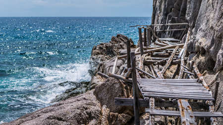 Old wooden brocken bridge on Koh Tao and Koh Nangyuan islands in Thailandの写真素材